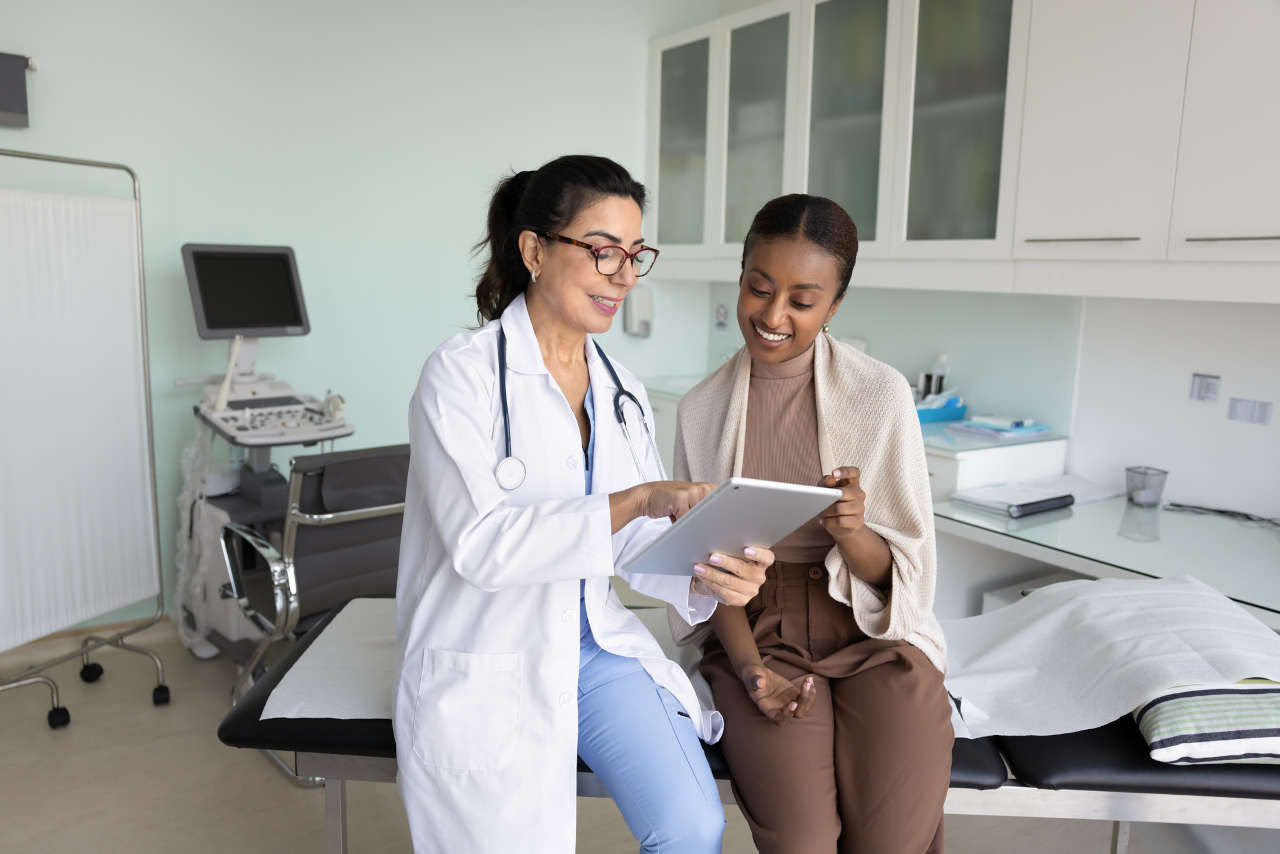Doctor discussing top biologic drugs with patient
